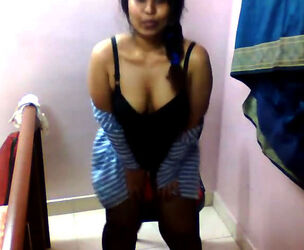 Indian Lil without bra and in pantyhose demonstrate