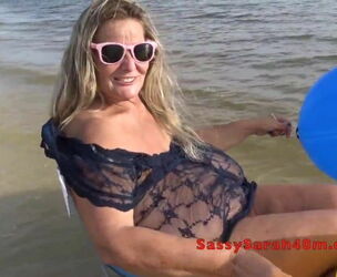 Ample saggy orbs wifey juggling at the beach