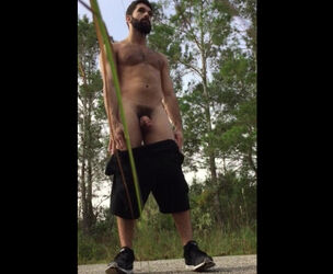 Bearded fag flashes his drill fuckhole outdoor